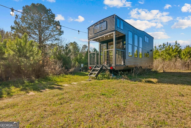 exterior space with a lawn