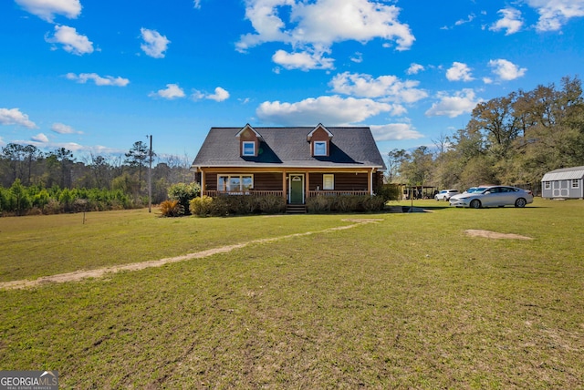 view of front of home with a porch and a front lawn