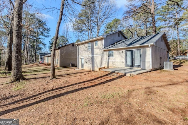 back of property featuring cooling unit, a patio area, and french doors