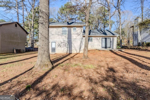 back of house with french doors