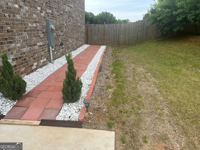 view of yard featuring fence