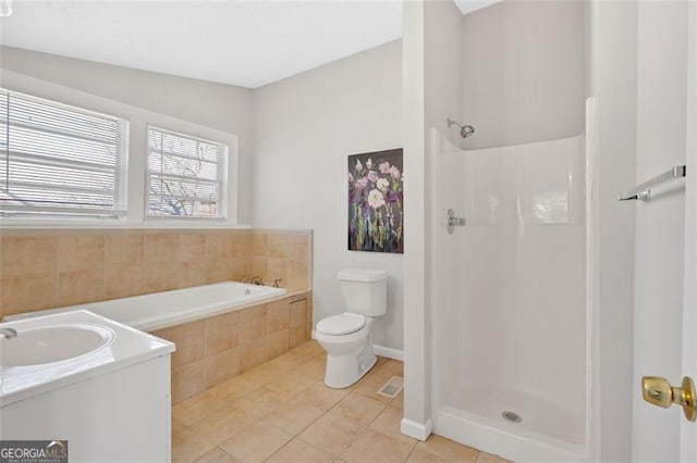 full bath featuring tile patterned floors, toilet, a shower, and a sink