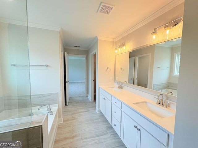 full bathroom with visible vents, double vanity, ornamental molding, a sink, and a bath