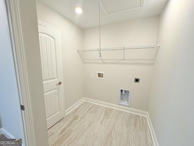 laundry room with washer hookup, laundry area, baseboards, and hookup for an electric dryer