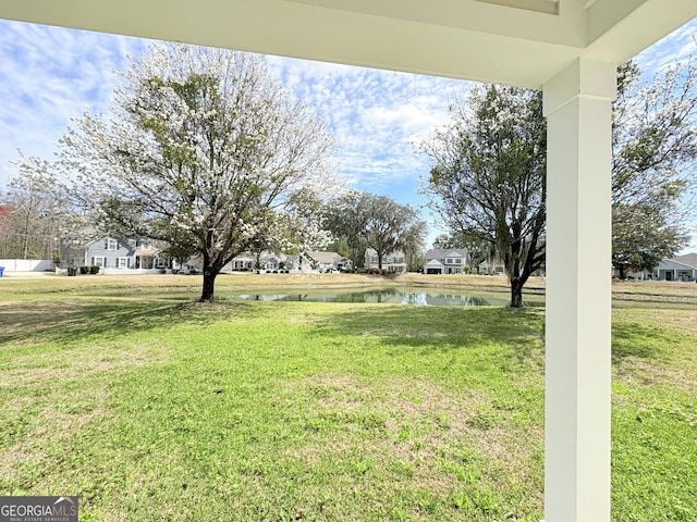 view of yard featuring a water view