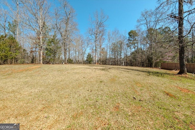 view of yard featuring fence