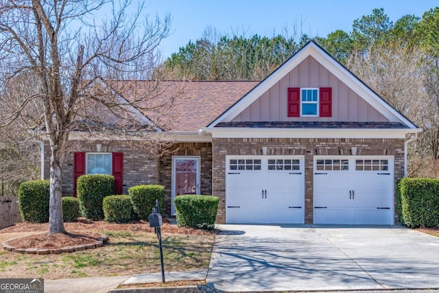 view of front of house featuring brick siding, board and batten siding, an attached garage, and driveway