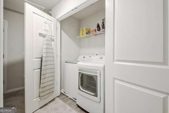 laundry area featuring laundry area and separate washer and dryer