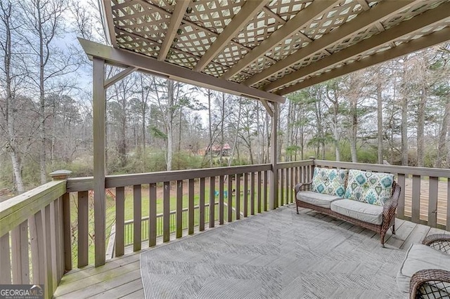 wooden terrace featuring a pergola