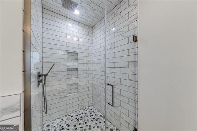 bathroom featuring a stall shower