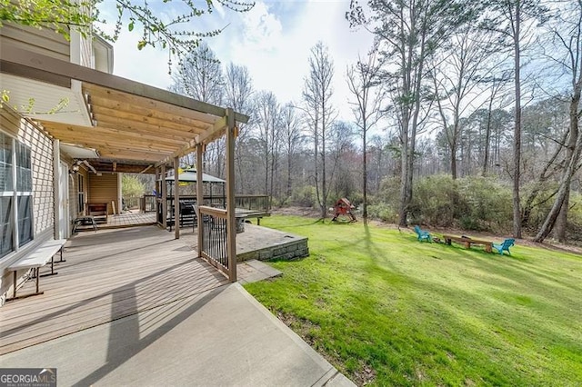 view of yard with a wooden deck