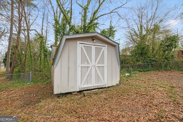 view of shed featuring a fenced backyard