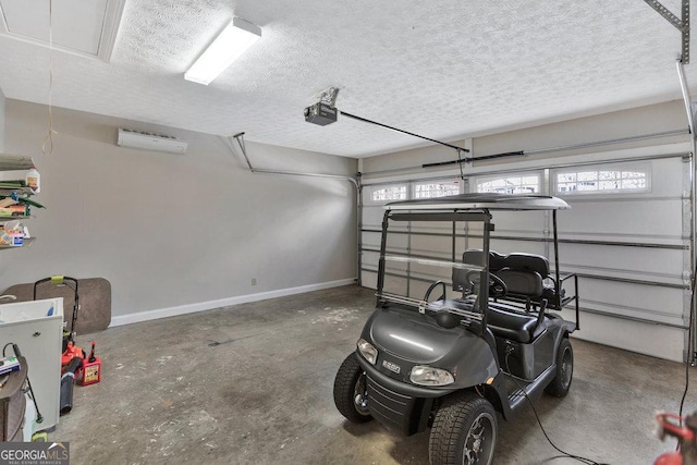 garage with a garage door opener and baseboards