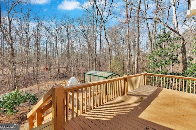 deck featuring an outbuilding