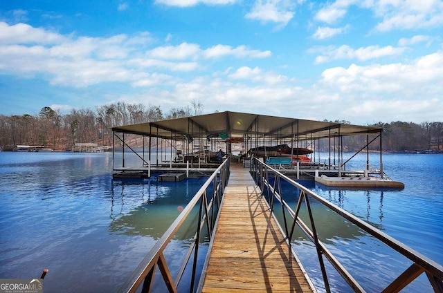 dock area featuring a water view