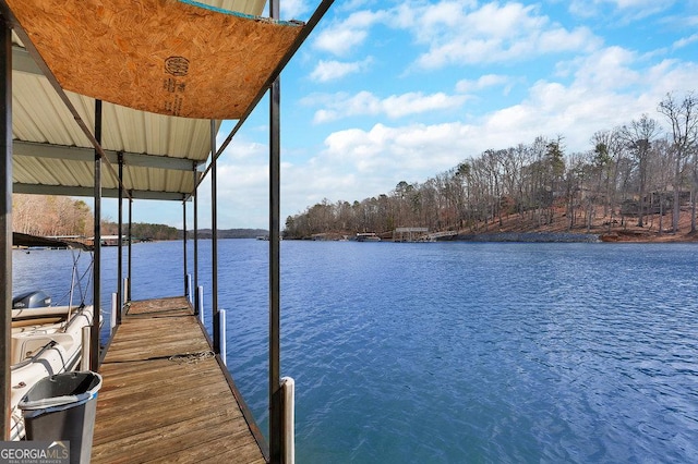 view of dock with a water view