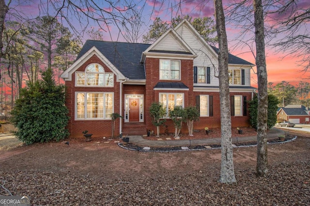 view of front of property with brick siding