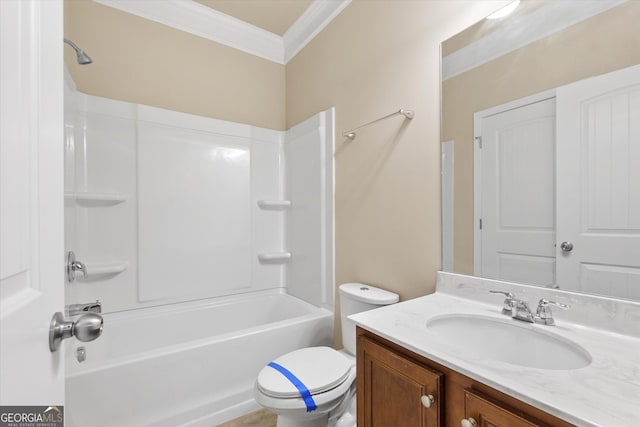 bathroom featuring toilet, vanity, crown molding, and shower / bathing tub combination