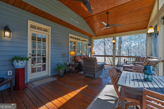 deck featuring an outdoor hangout area and ceiling fan