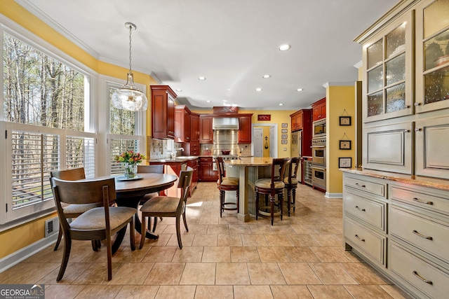 dining room featuring recessed lighting, visible vents, baseboards, and ornamental molding