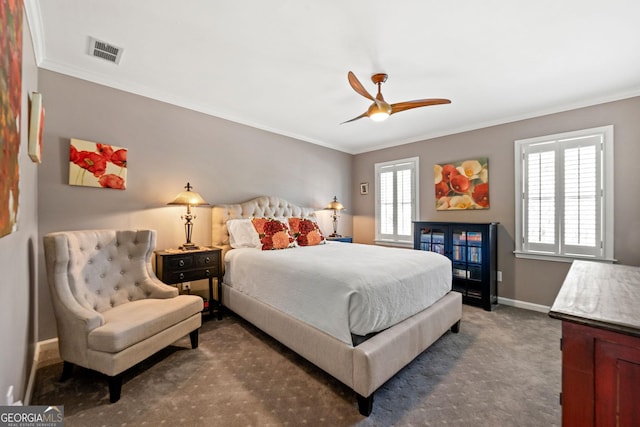 bedroom featuring visible vents, baseboards, carpet, and ornamental molding