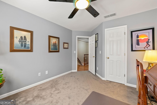 unfurnished bedroom featuring baseboards, visible vents, and ceiling fan