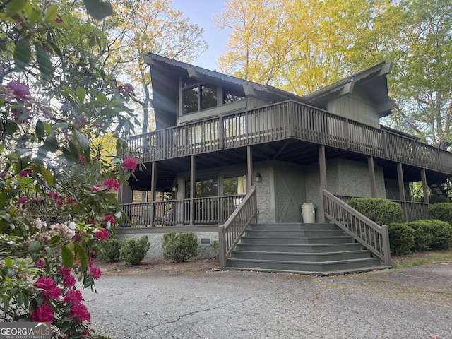 63 Mashie Ln, Sky Valley, GA 30537 - back of house featuring stairs
