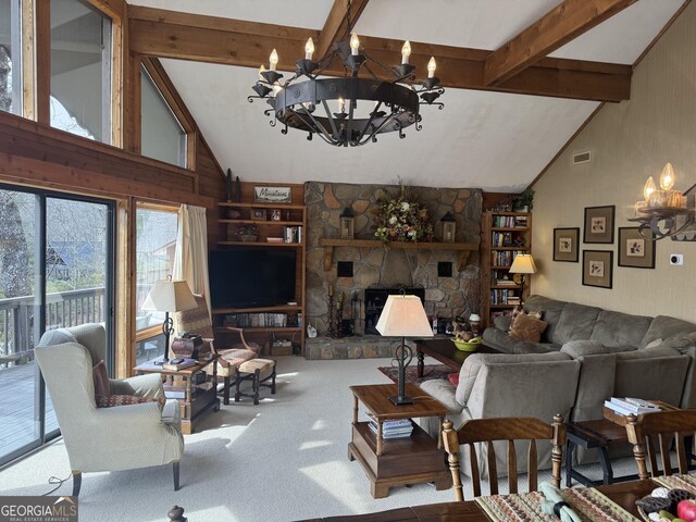 63 Mashie Ln, Sky Valley, GA 30537 - living area with a chandelier, beam ceiling, carpet flooring, high vaulted ceiling, and a fireplace
