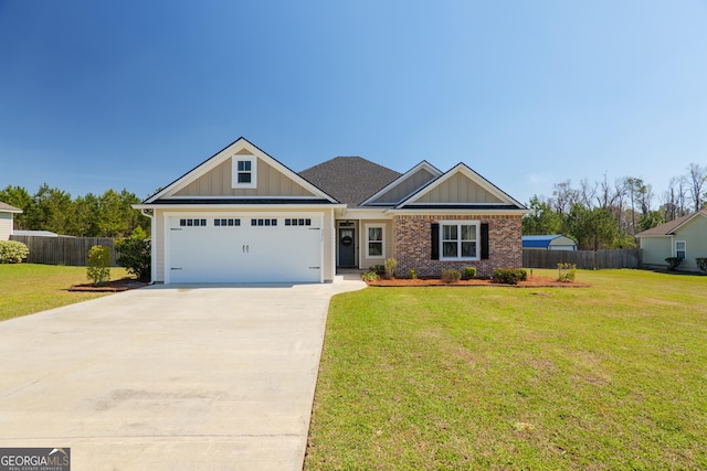 craftsman house featuring board and batten siding, concrete driveway, a front lawn, and fence