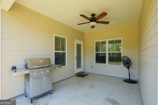 view of patio / terrace with grilling area and ceiling fan