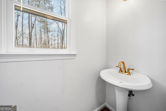 bathroom featuring baseboards