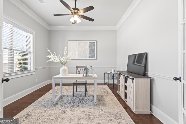 home office with baseboards, dark wood finished floors, a ceiling fan, and crown molding