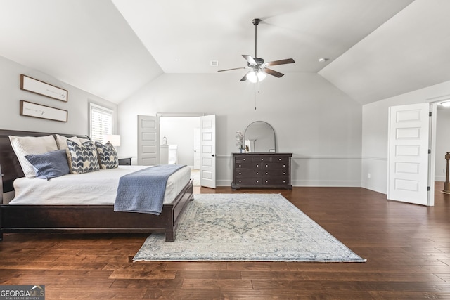 bedroom featuring baseboards, dark wood-type flooring, ceiling fan, and vaulted ceiling