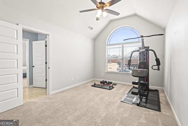 exercise room with visible vents, baseboards, lofted ceiling, carpet flooring, and a ceiling fan