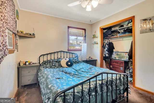 bedroom with a closet, baseboards, carpet, and crown molding