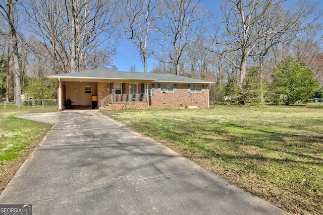 single story home with brick siding, a front lawn, a carport, concrete driveway, and crawl space