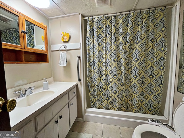 full bathroom featuring tile patterned floors, visible vents, toilet, a shower with curtain, and vanity