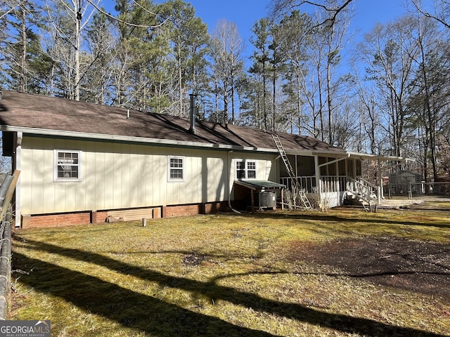 exterior space featuring crawl space and a yard