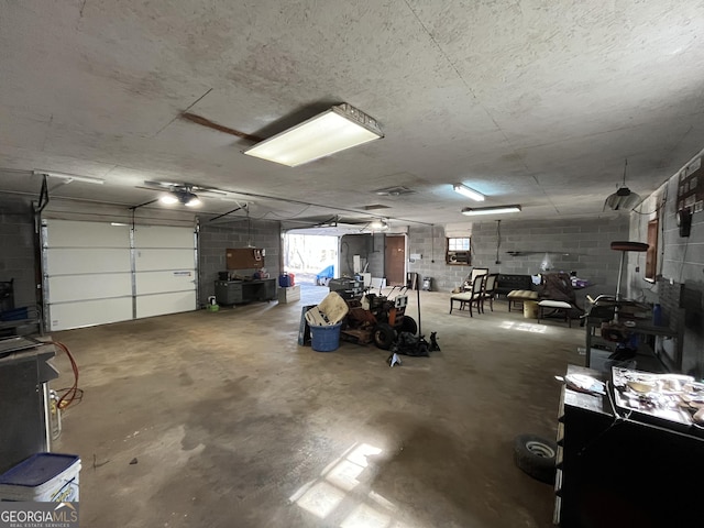 garage featuring concrete block wall