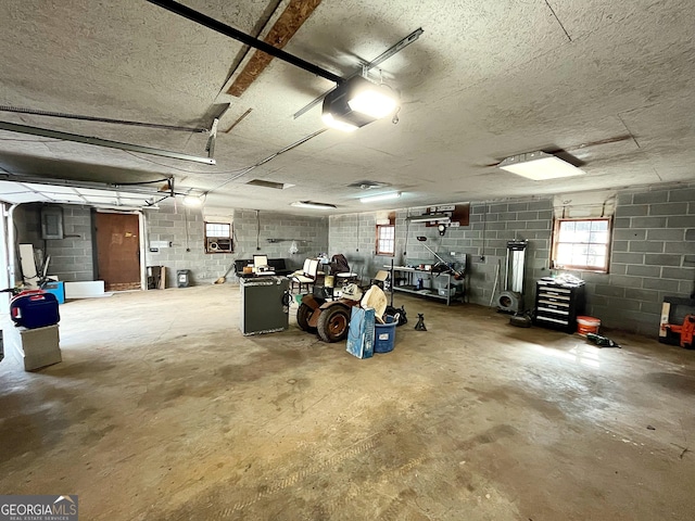 garage featuring concrete block wall