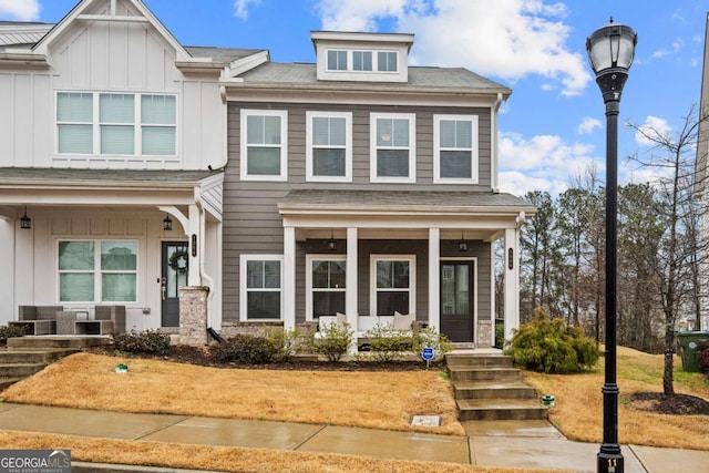 view of front of property featuring board and batten siding and covered porch