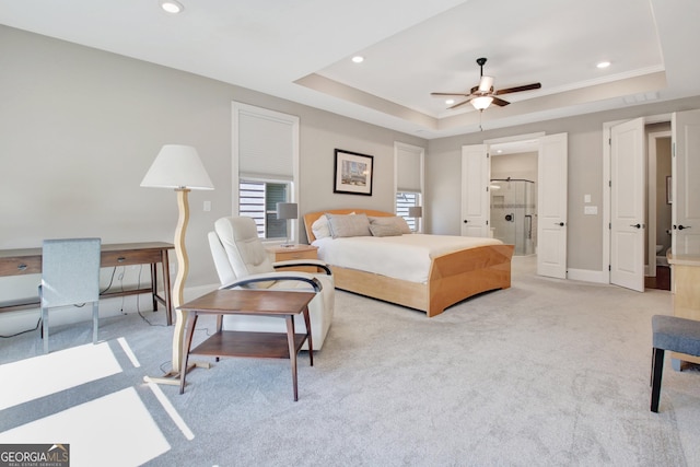 bedroom with carpet, baseboards, visible vents, a tray ceiling, and recessed lighting