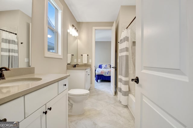 full bathroom featuring toilet and vanity