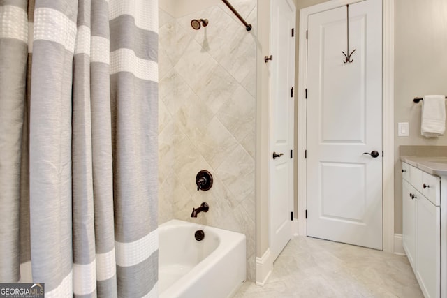 full bathroom featuring vanity and shower / bath combination with curtain