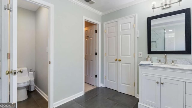 bathroom featuring tile patterned floors, visible vents, toilet, ornamental molding, and vanity