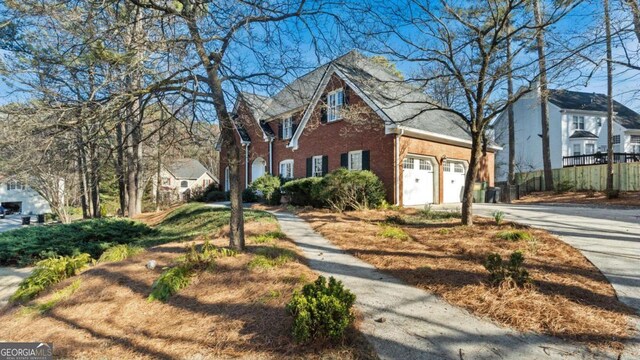 view of front of house with brick siding