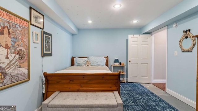 bedroom with recessed lighting and baseboards