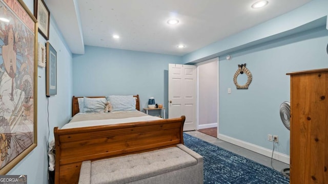 bedroom with recessed lighting and baseboards