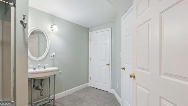 bathroom featuring baseboards