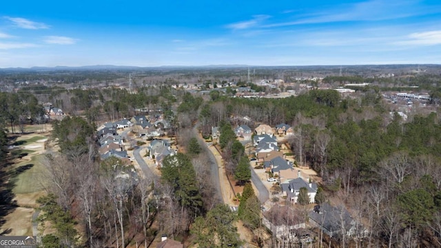 aerial view with a forest view and a residential view